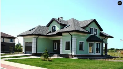 Зеленые каменные стены и серая крыша: стильное сочетание на изображении