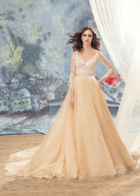 Феерическая элегантность: свадебные платья розового оттенка воплощают нежность.