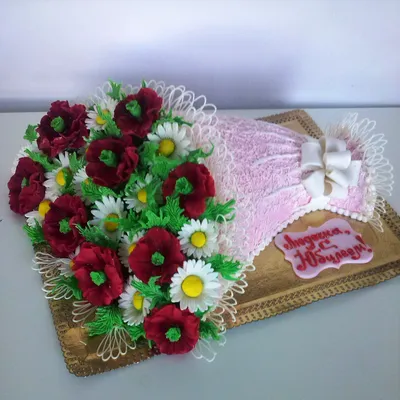 Природа на вашем торте: Изумительный фотографический снимок торта, украшенного цветами.