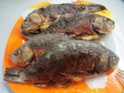 Жареная рыба на луковой подушке, пошаговый рецепт с фото